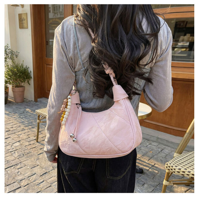 Casual and simple dumpling-shaped women's personalized and fashionable shoulder bag for daily use, with a crossbody design