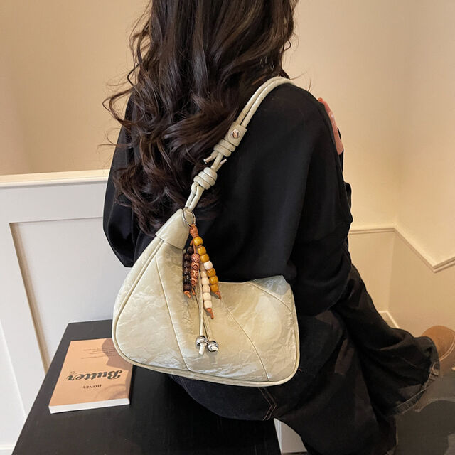 Casual and simple dumpling-shaped women's personalized and fashionable shoulder bag for daily use, with a crossbody design