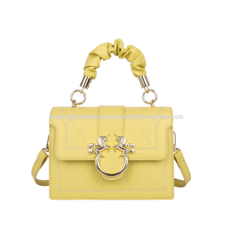 large yellow leather handbag