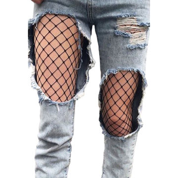 fishnet tights and ripped jeans