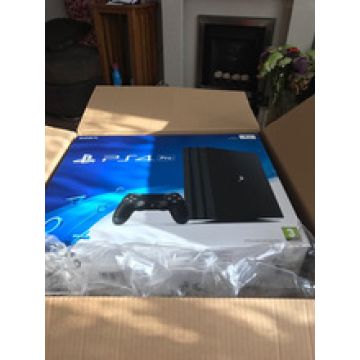 playstation 4 pro with 2 controllers