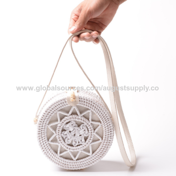 white round crossbody bag