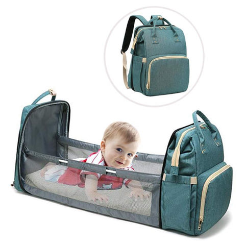 diaper bag and crib