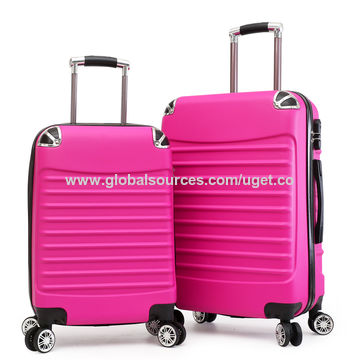 pink hard luggage