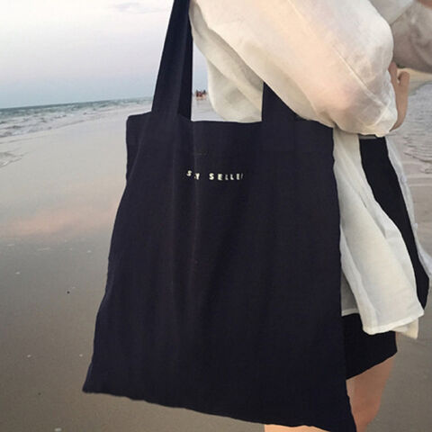 black canvas beach bag