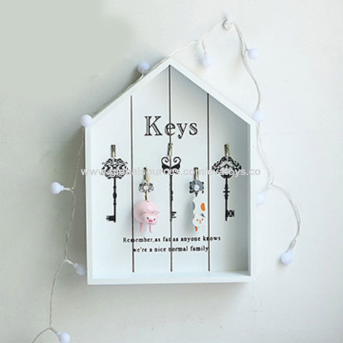 key holder for wall with door