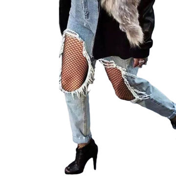 ripped jeans with fishnet tights