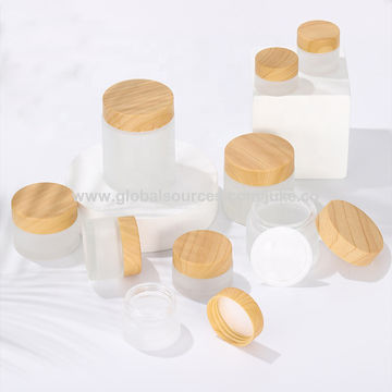 Download China 5ml 10ml 15ml 30ml 50ml 100ml Cosmetic Mini Frosted Glass Cream Jar With Bamboo Plastic Lids On Global Sources Cosmetic Jars Glass Jars Cosmetic Packaging