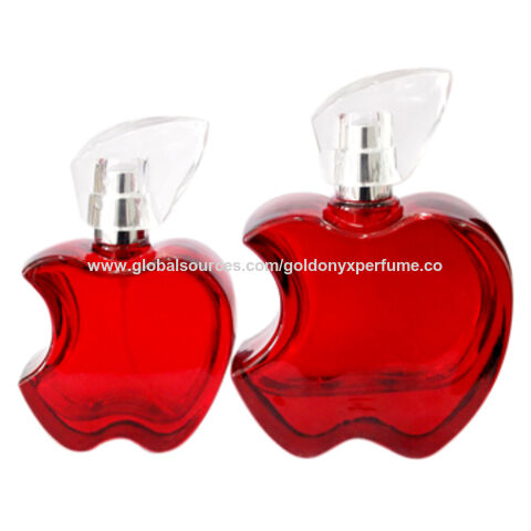 perfume in red apple shaped bottle