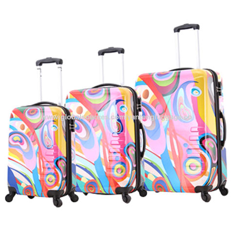 colorful suitcases with wheels