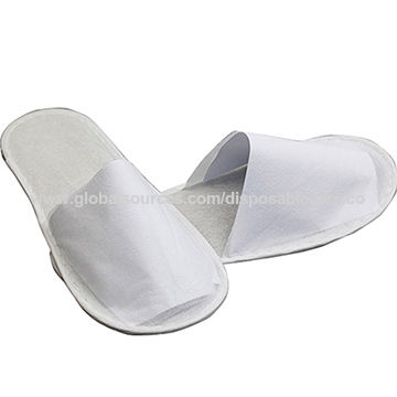 white hotel slippers