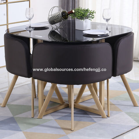 China Glass round top dining table with 4 chairs set. on Global 