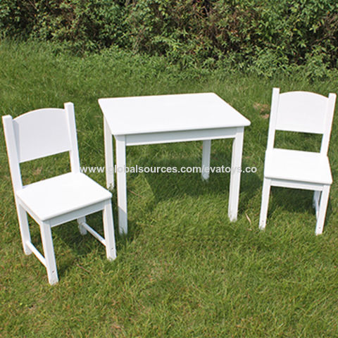 kids white wooden table and chairs