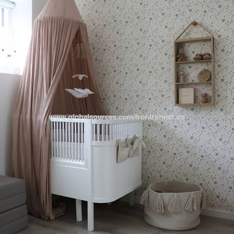 white and wood baby crib