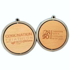 Triathlon United Edmonton Supports Sports and Community 90 years spinning Wooden Medal