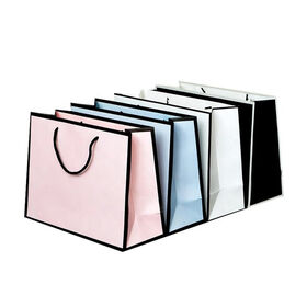 Sacs en papier couché personnalisés en gros pour boutiques de vêtements, parfaits pour le shopping et les cadeaux