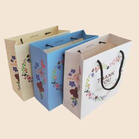 Custom Luxury Ribbon Handle Thickened Clothing Hand Held Bag Shopping Gift Paper Bag