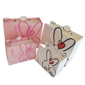 Sacs en papier kraft blancs écologiques en gros, sac fourre-tout avec motif de lapin de dessin animé, sac en papier cadeau pour enfants