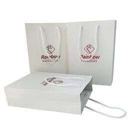 Sac en papier cartonné blanc biodégradable de luxe, portable, pliable, avec poignée pour le shopping en gros