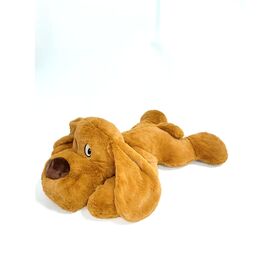 Cute puppy lying on prone, plush toys for dog
