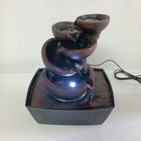 Fuente de agua eléctrica interior de resina al por mayor con bomba e iluminación LED para decoración del hogar