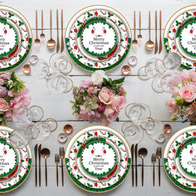 Festive bone china Christmas plate with holiday designs and 'Merry Christmas andHappy New Year' text part of a full dinnerware set