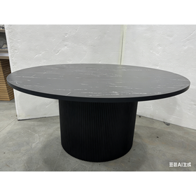 Minimalist industrial style black round coffee table with vertical stripes on the slab tabletop, small living room table.