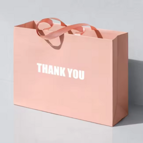 Bolsas de papel de regalo personalizadas de color rosa con logotipo para agradecimiento