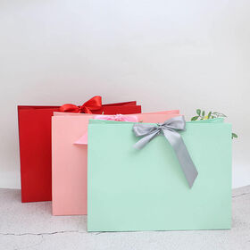 Sac de papier cadeau de vente au détail de luxe Emballage de vêtements personnalisés Papier d'art Prix bas pour la promotion de supermarché