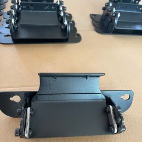 The fabrication of custom metal components is achieved through expert CNC bending, precision stamping, and masterful craftsmanship