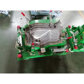 Export von Mess- und Prüfvorrichtungen für die Inspektion von Metallstanzteilen für einen Kunden in Spanien, Komponenten für Automobil-Sitz- und Türbeschläge.