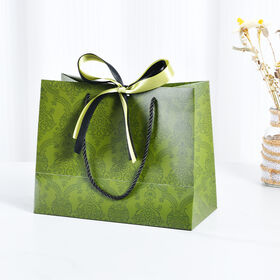 OEM Luxury Cosmetics Packaging Bag with Ribbon Bow New Design Kraft Paper Bag for Clothes Shoes Shopping Gifts Customizable Logo
