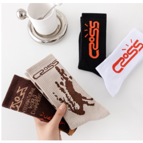 Wholesale Travis Scott long socks for both men and women, trendy and versatile for sports, mid-calf length socks.