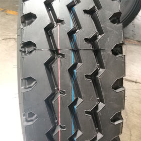Wear resistant heavy vehicle rubber tire