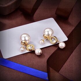 Authentische CD Tribales Ohrringe mit Gold-Finish und Perlen aus Metall - Modeschmuck von Designern